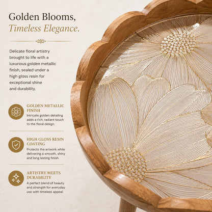 A close-up of a carved wooden Table featuring a large floral design with metallic gold and beige inlay details, shown on a warm beige background with descriptive text about the finish and resin coating.